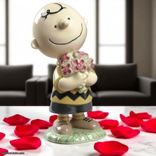 NAO by Lladró – Playing with Hello Kitty Figurine